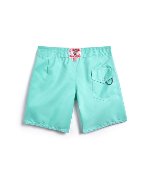 Back of the 300 Boardshorts in Aqua. Back pocket on right side with button closure and key loop. License Plate Label with Birdwell Logo and Made In USA on waistband. 
