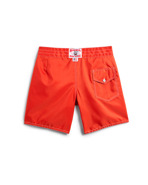 Back of the 300 Boardshorts in Orange. Back pocket on right side with button closure and key loop. License Plate Label with Birdwell Logo and Made In USA on waistband.  