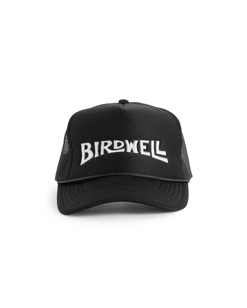 Front view of Wordmark Trucker in Black, Birdwell Logo embroidered in white.