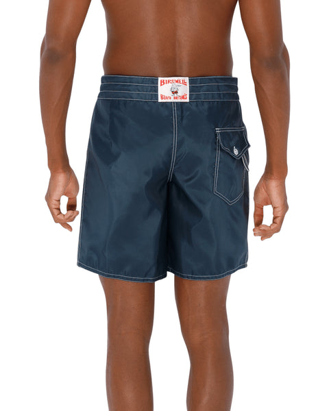 Model wearing the 311 Boardshorts in Navy, back view.