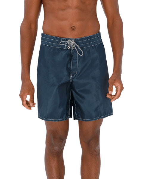 Model wearing the 311 Boardshorts in Navy, front view.