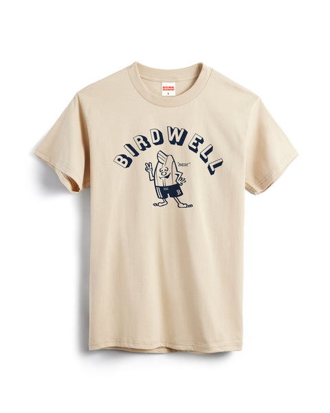 Sand t-shirt with 'Birdwell' logo with Birdie Illustration underneath in Navy on a white background.