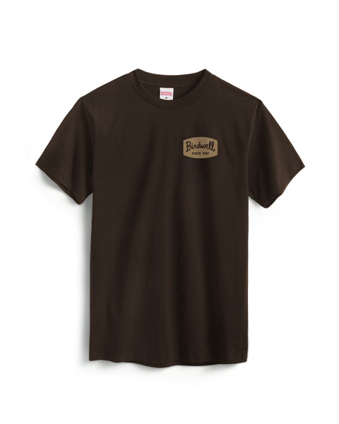 Brown t-shirt with a screenprinted Bridwell Since 1961 Graphic on the chest against a white background.