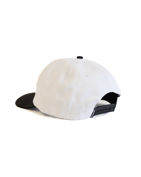 White and black cap on a white background