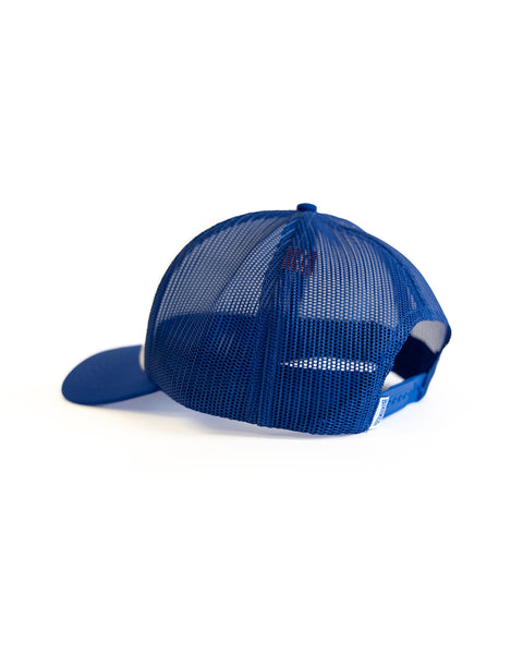 Back of the blue mesh Birdwell trucker hat on a white background