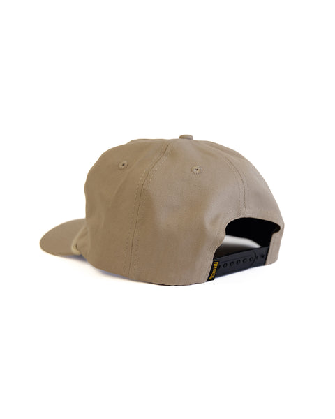 Beige cap on a white background
