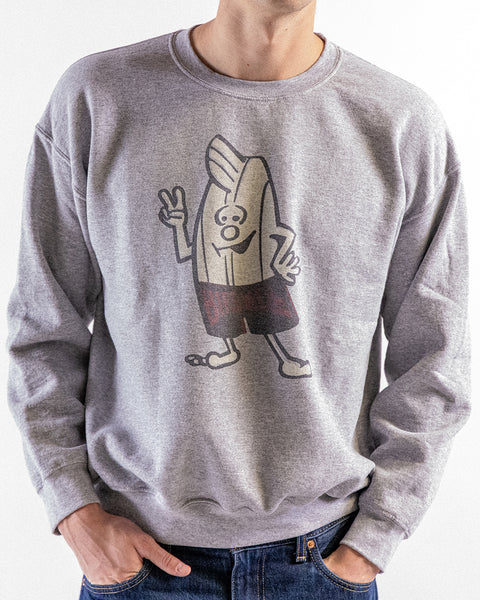 Person wearing a gray sweatshirt with a birdie on a white background