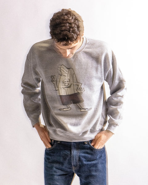 Person wearing a gray sweatshirt with a birdie graphic on a white background