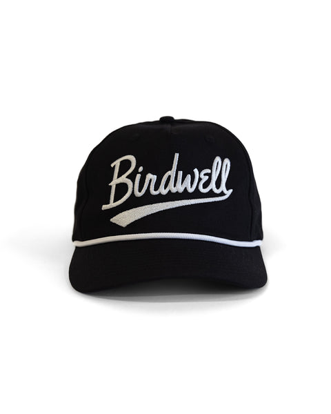 Black cap with 'Birdwell' logo on a white background