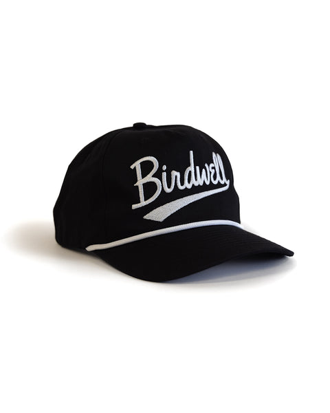 Black cap with 'Birdwell' logo on a white background
