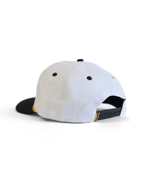 White cap with black brim and accents on a white background