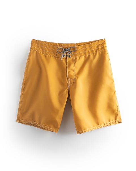 Image shows the front view of the 311 Boardshorts in Gold.