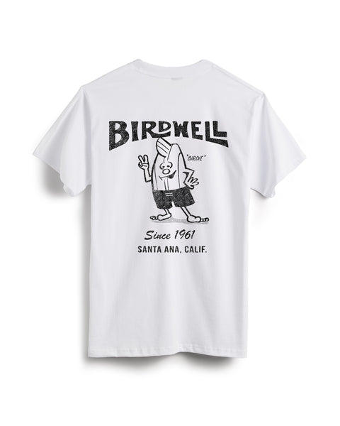 Back view of the white t-shirt with large black screen printed graphic of the Birdwell Logo over Birdie holding up the peace sign with text Since 1961 Santa Ana, Calif. below over a solid white background.