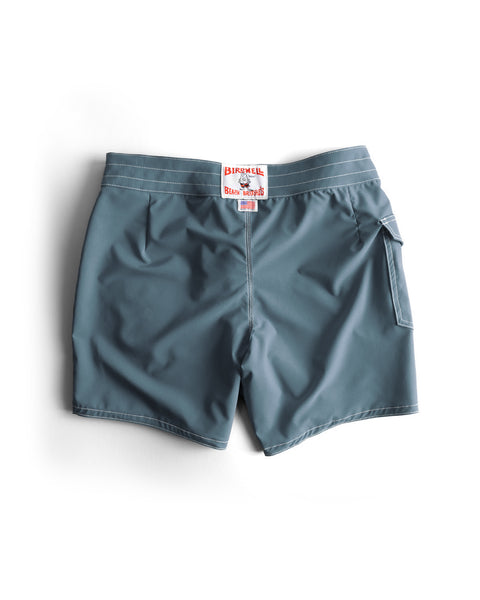 Back view of the 806 Boardshorts in Federal Blue. Product on white background. License Plate Label on Waistband with Made In USA label beneath.