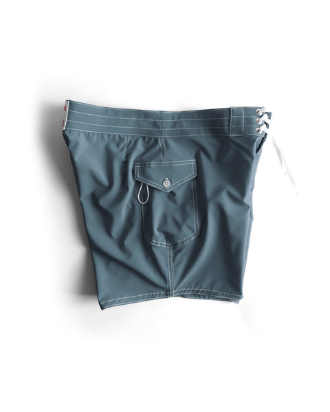 Side view of the 806 Boardshort in Federal Blue, Side pocket with white key loop. Product on white background.