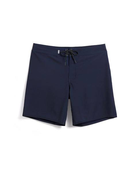 Birdie Boardshorts in Navy. Black drawcord with brass grommets. Logo label on waistband in white.