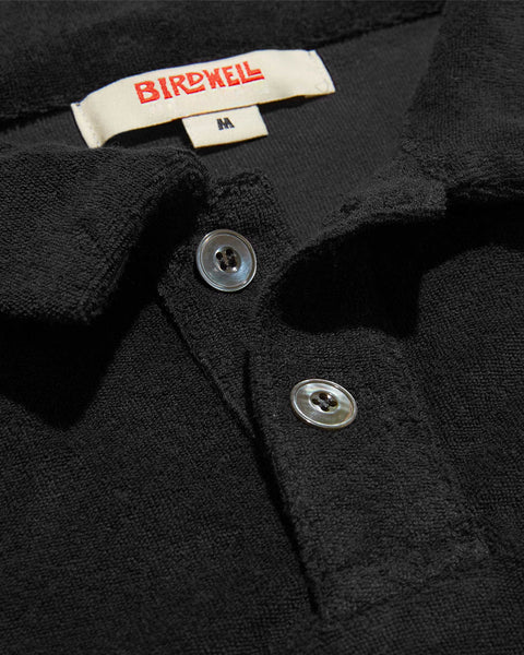 Collar detail of Birdie Smile Terry Polo in Black.