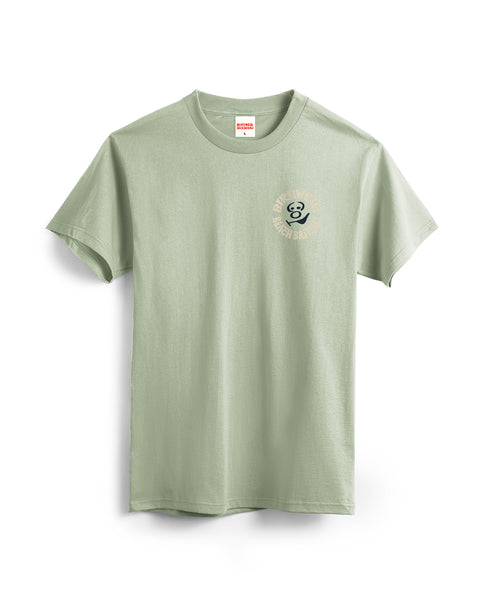 Light green t-shirt with a small logo on a white background