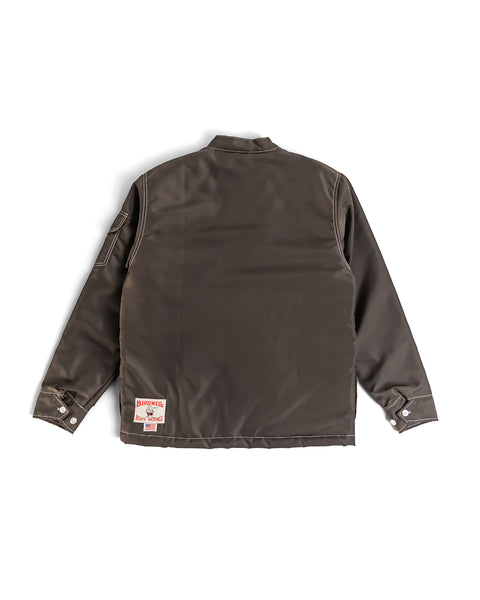 Birdwell Quilted Racing SurfNyl® jacket in brown with a Birdwell patch on the bottom left on a white background