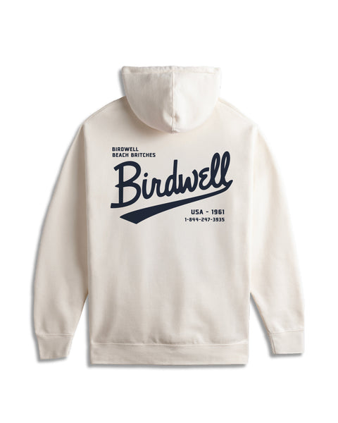 Beige hoodie with 'Birdwell' logo on the back against a white background