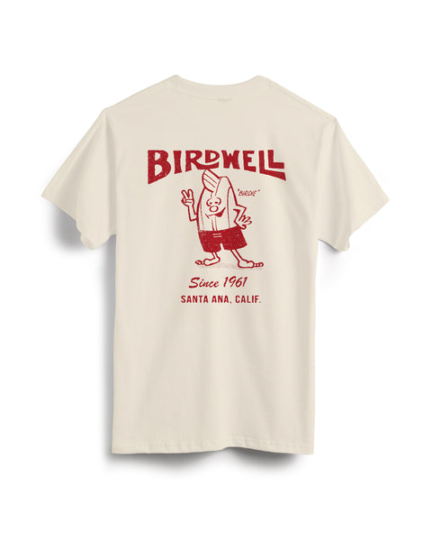Beige t-shirt with red 'Birdwell' logo on the back against a white background