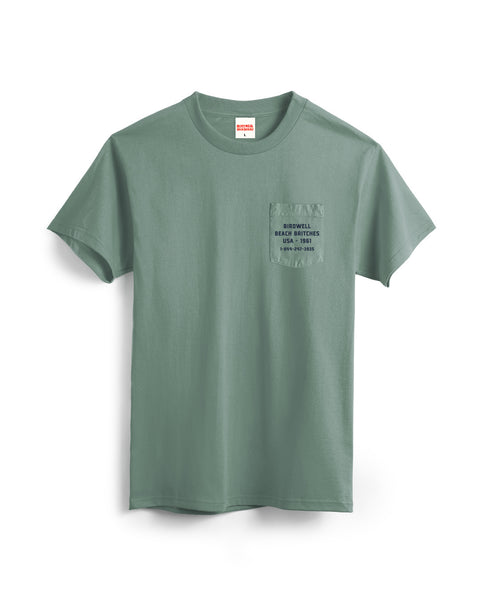 Green t-shirt with a small logo on a white background