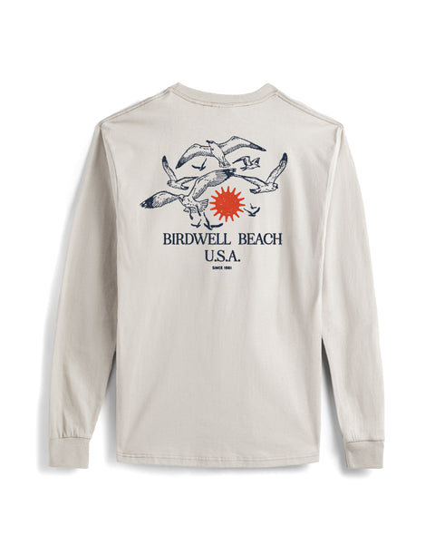 Beige long-sleeve shirt with 'Birdwell Beach USA' graphic on a white background
