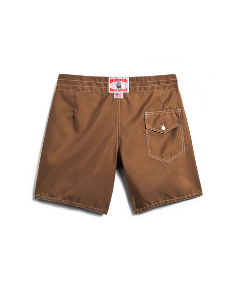 Brown shorts with a visible brand label on a white background
