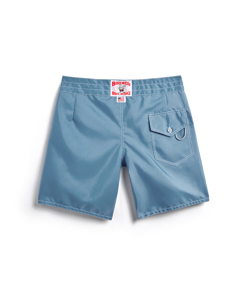 Blue shorts with a brand label on a white background