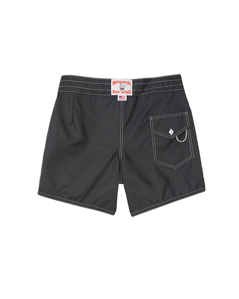 Black shorts with a visible brand label on a white background