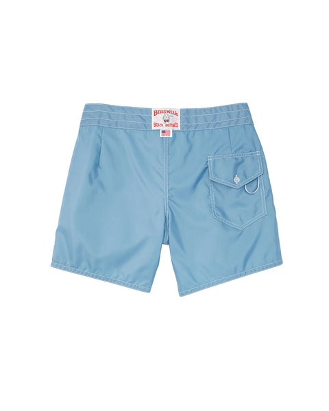 Light blue shorts with a brand label on a white background