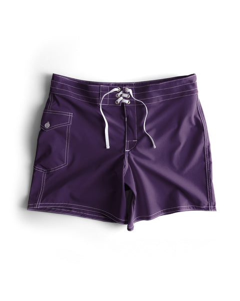 Purple swim shorts with a drawstring on a white background