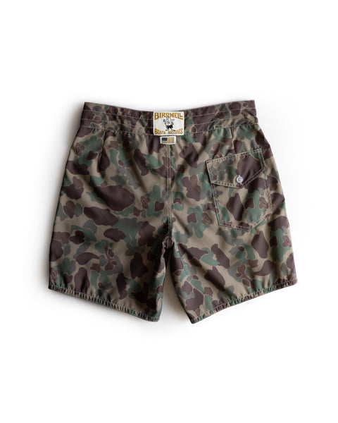 The 300 Boardshorts - Frogskin Camo are men's boardshorts shown from the back, featuring a single buttoned back pocket and a sewn-on SurfNyl brand label above the waistband.