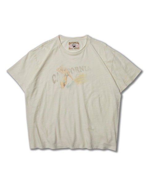 The Surf Slub Tee - Vintage White is a cream-colored, vintage-washed organic cotton t-shirt with short sleeves, a faded graphic and 