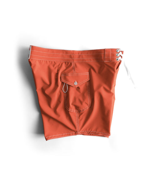 806 SurfStretch Side Pocket Boardshorts in Paprika, featuring white stitching, a back pocket with button flap and key loop, and white lace-up ties at the waistband, displayed on a white background. These stretch boardshorts are designed for comfort and durability.