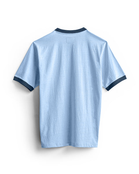 The Special Teez Ringer in Arctic Blue/Navy is displayed from the back, highlighting its dark navy trim on the collar and sleeve cuffs. Made from 100% cotton, this premium short-sleeve t-shirt is set against a plain white background.