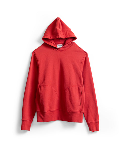 The Harmony Hoodie - Red, crafted from soft French terry with a front pocket, is shown laid flat on a white background.