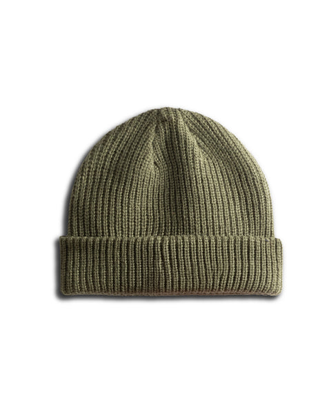 The Powerbird Watchcap - Army is an olive green ribbed beanie hat in a classic fisherman style, featuring a folded cuff and finished with the signature Powerbird patch, displayed on a white background.