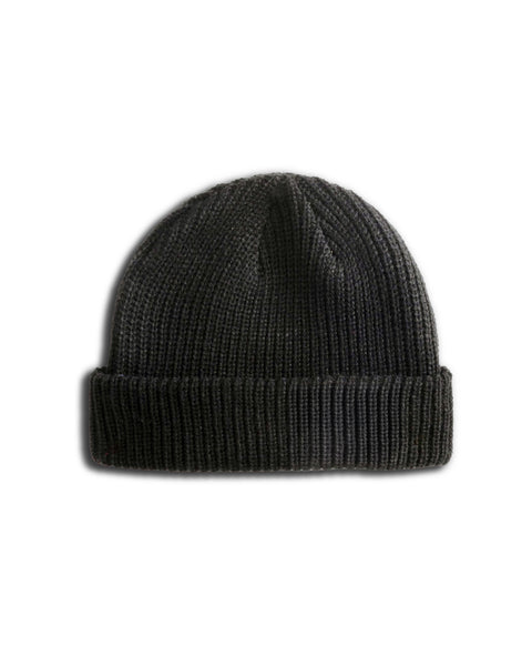 The Potato Watchcap - Coal is a black ribbed fisherman beanie hat featuring a cuffed hem and folded brim, displayed on a white background.