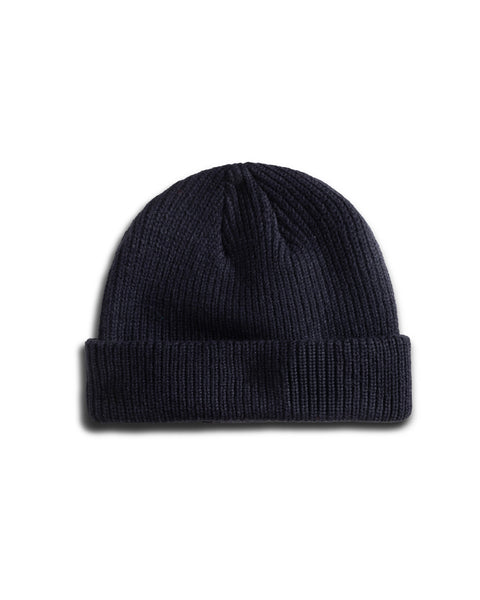A Potato Watchcap in navy, featuring wide ribbed knit and a cuffed hem, displayed on a white background.