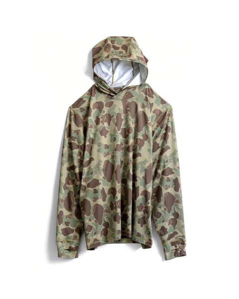 The Sunteez Hoodie - Frogskin Camo, a long-sleeve hooded shirt with a green and brown camouflage pattern and UPF50+ sun protection, is laid flat on a white background.