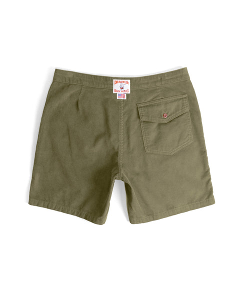 Classic Corduroy Shorts - Fatigue in olive green, shown from the back, feature a mid-length corduroy design with an elastic waistband and adjustable drawcord waist, a single buttoned back pocket on the right side, and a white inner label with red and blue text at the waistband.