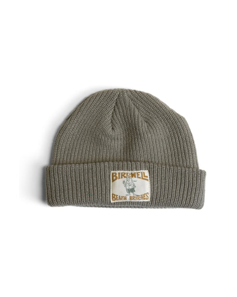 Eucalyptus License Plate Watchcap featuring a ribbed knit, folded cuff, and a rectangular patch with a license plate design including Birdwell Beach Britches and a cartoon surfboard character.