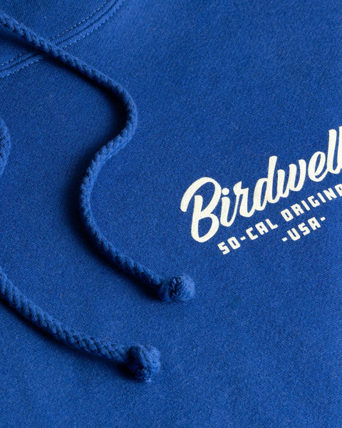 Detail of front graphic of Day Dreamin' Hoodie in Royal Blue