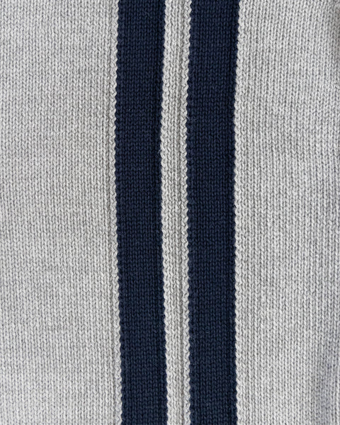 Close-up of a fabric with navy and gray stripes