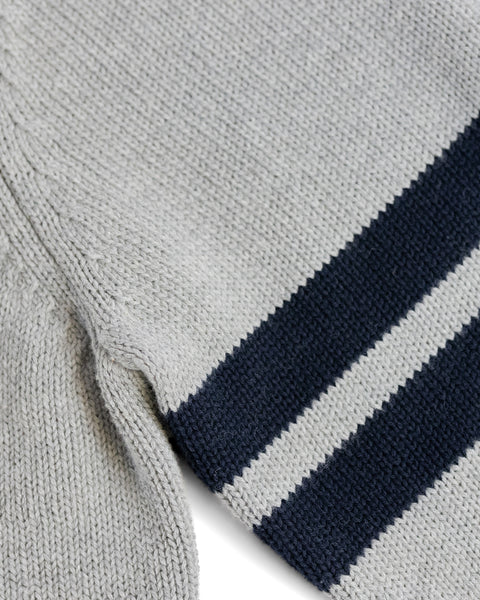 Close up detail of the woven stripes in navy.