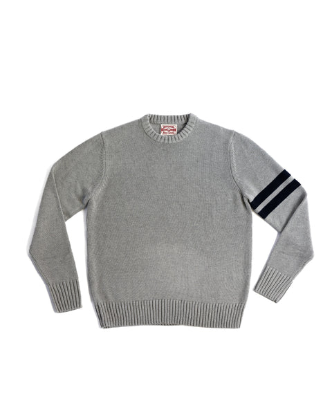 Front View of the Comp Stripe Sweater in Grey with two bone stripes on the left arm. Product on white background.