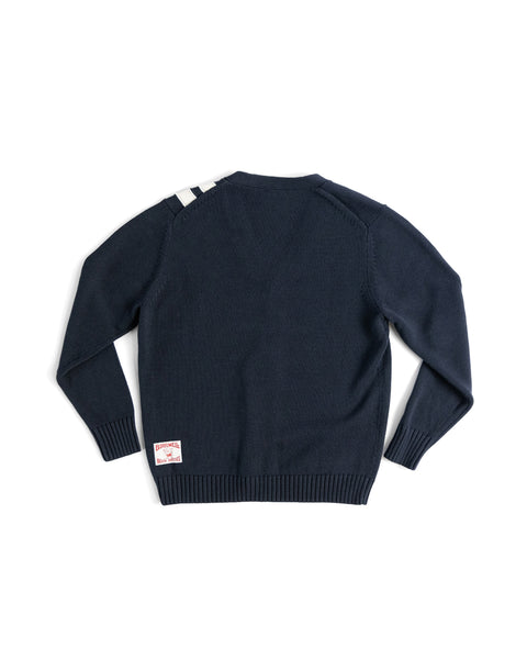 Navy blue sweater with a brand label on the back on a white background