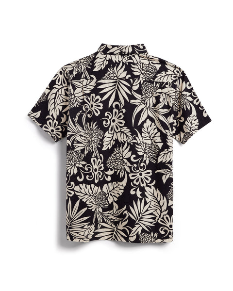 100% cotton button down shirt in a vintage-inspired original floral print in black. View showing back of shirt.