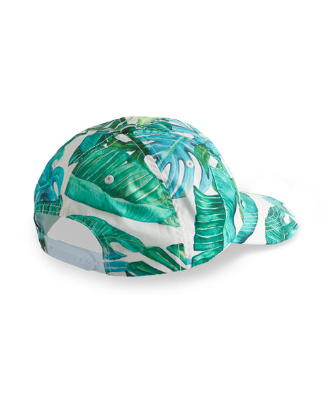 Image shows back view Paradise Snapback. Pattern depicts monstera leaves with white background.